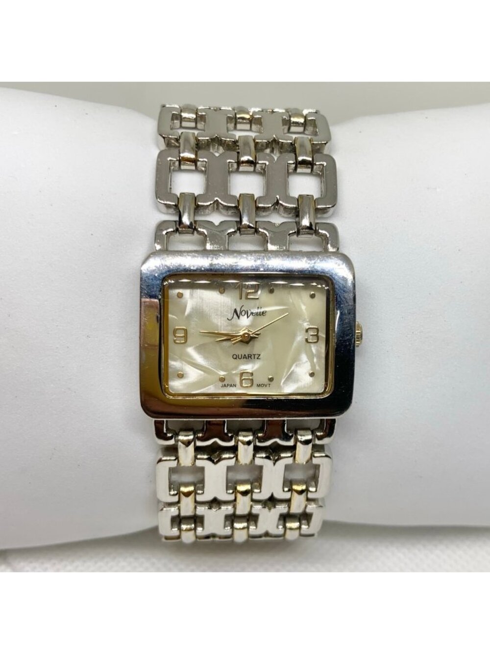 Novelle women’s silver tone watch 27mm quartz analog mop dial size 7” running